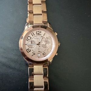 Michael Kors watch.  Unisex. Rose Gold
